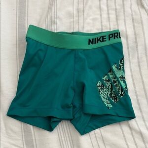 Teal Nike pros
